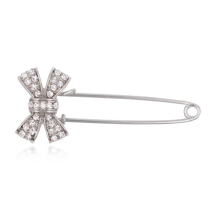 Bow shaped pin brooch rhinestone silver